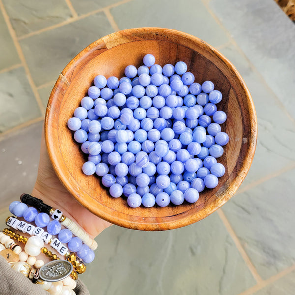 Blue lace agate beads 10mm in a bowl