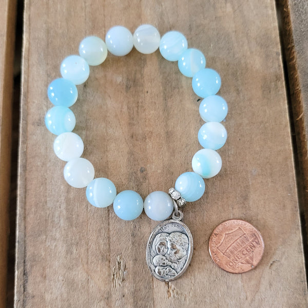 10mm sky blue agate beads Holy Family 1" medal stretch bracelet