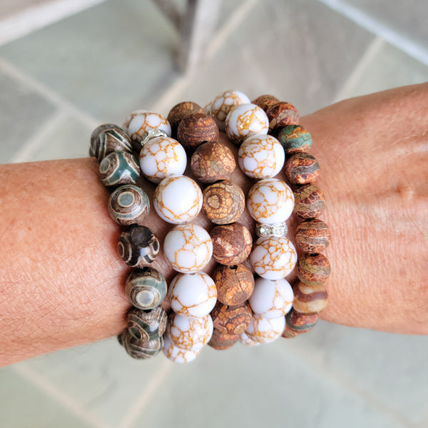 beaded stretch bracelets stacked on a wrist