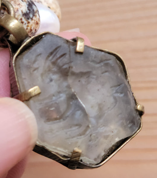Softly carved dragon Quartz charm