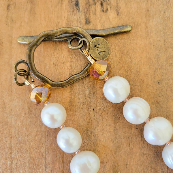 freshwater pearl brass toggle clasp close up