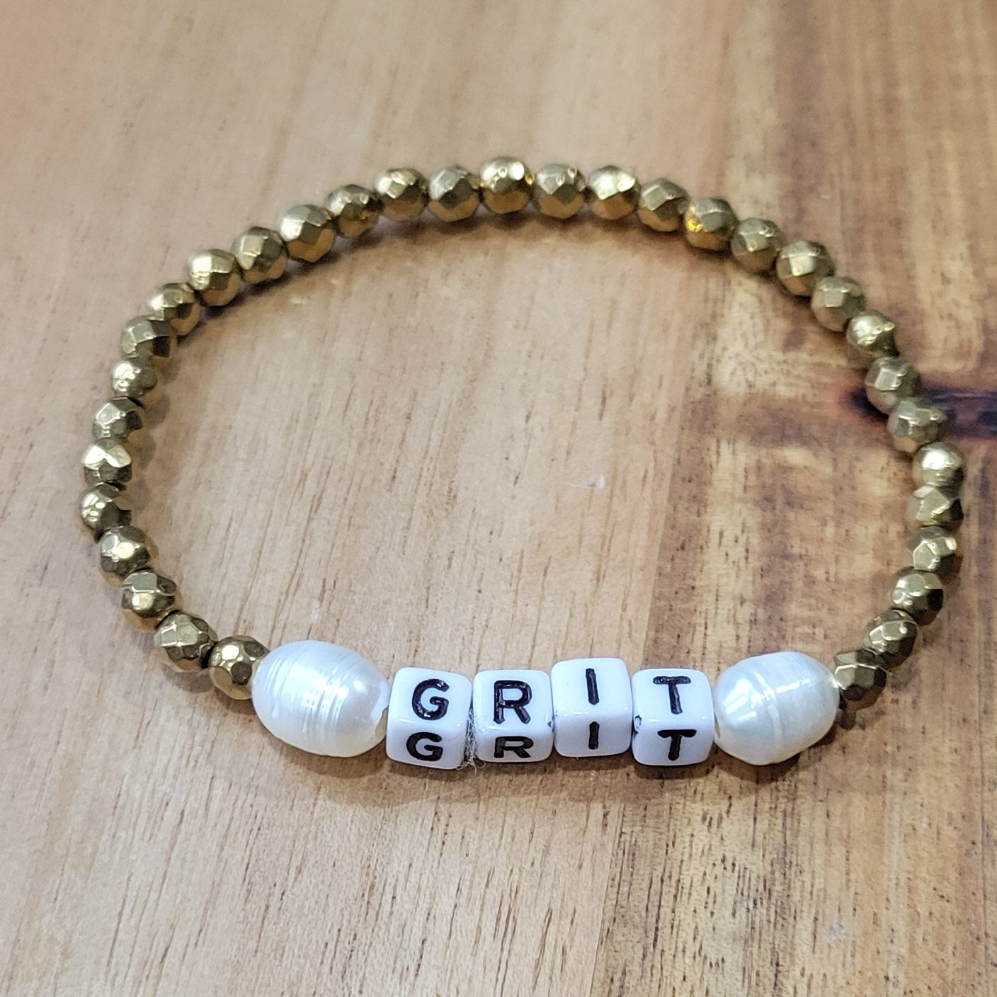 gold hematite, freshwater pearls and mini letter GRIT beads stretch bracelets