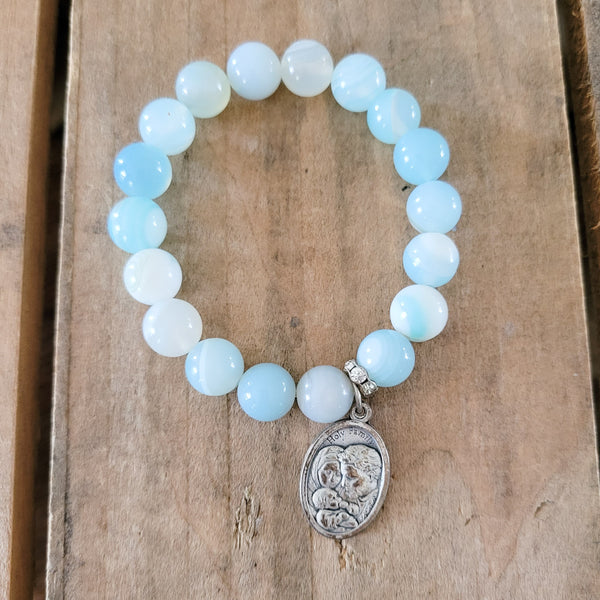 10mm sky blue agate beads Holy Family 1" medal stretch bracelet