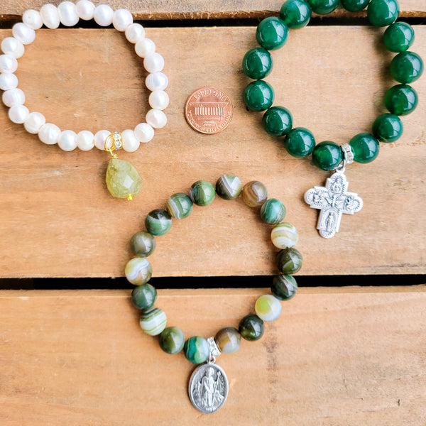green stretch bead bracelets w medals