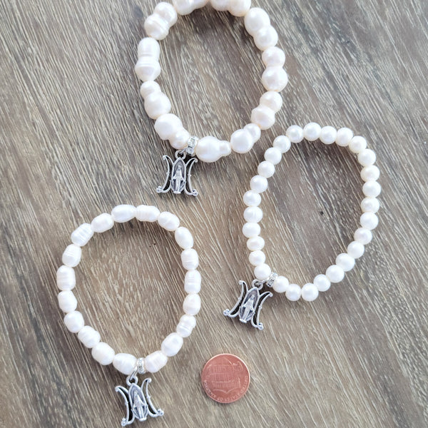 Potato, rice or peanut shaped freshwater pearls stretch bracelets with Miraculous M medal