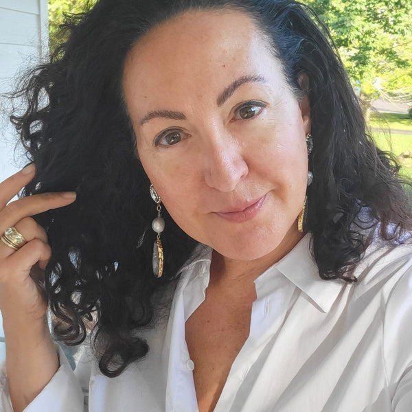 Marinella wearing one-of-a-kind earrings