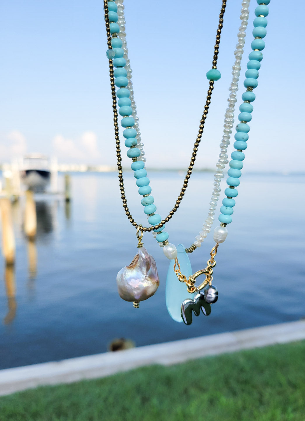 3 freshwater donned pearl + necklaces on the bay