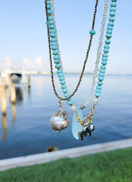 3 freshwater donned pearl + necklaces on the bay
