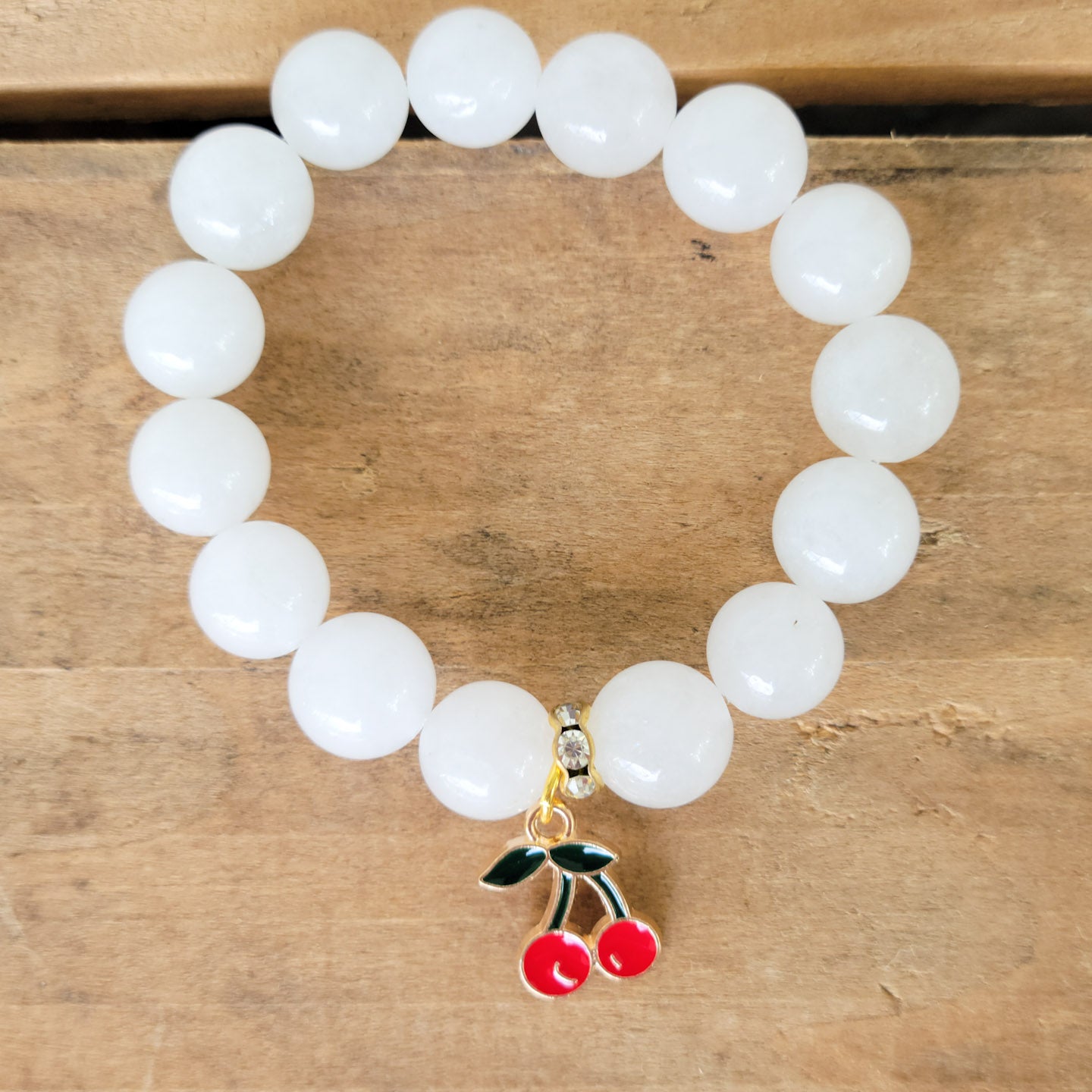 white quartz beads enamel red cherries charm stretch bracelet