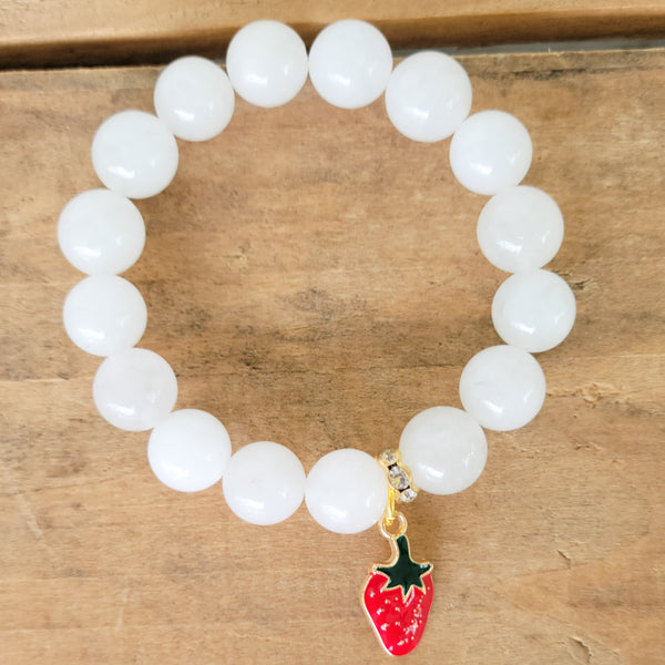 white quartz beads enamel red strawberry charm stretch bracelet