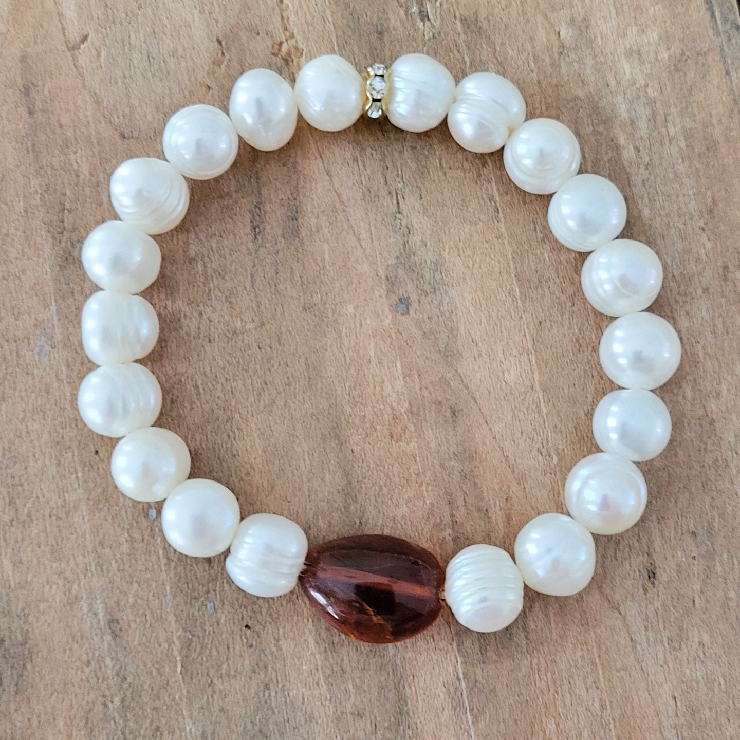 Pearls and oval amber protection bracelet