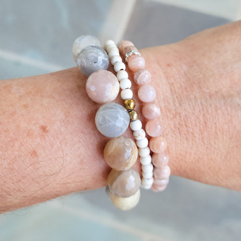 sunstone and howlite gemstone bead stretch bracelets