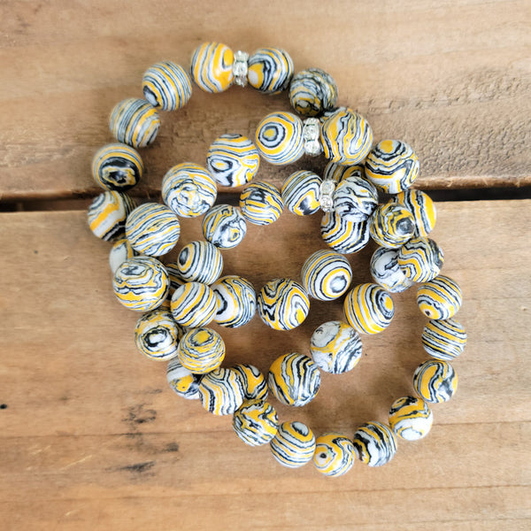 swirled yellow, black & white agate stretch bead bracelets