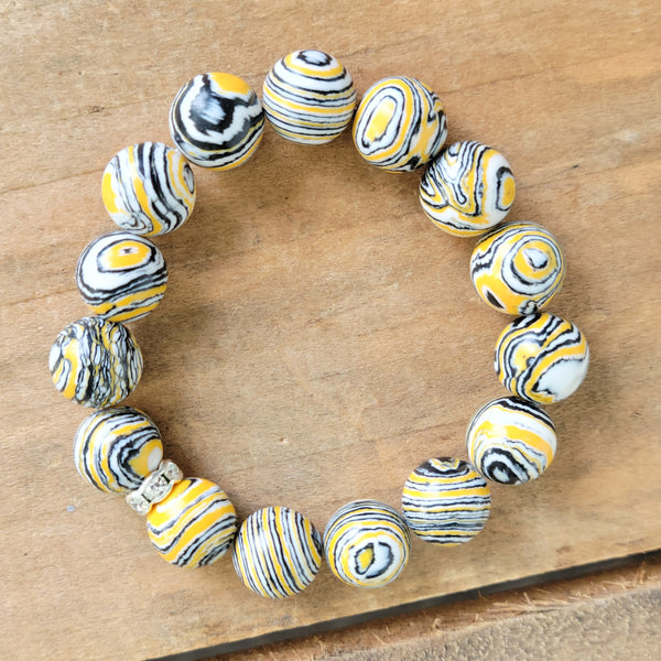 12mm swirled yellow, black & white agate stretch bead bracelet