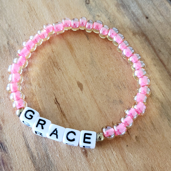 Pink Czech word stretch bracelets GRACE