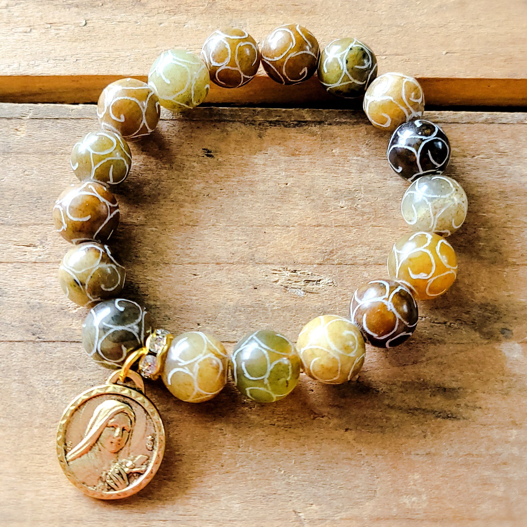 12mm swirled tan agate beads w gold tone 1" round St. Theresa Little Flower bracelet