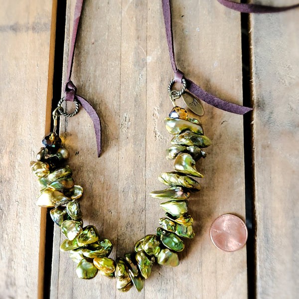38" long leather and 15mm green gold ruffled freshwater pearls necklace