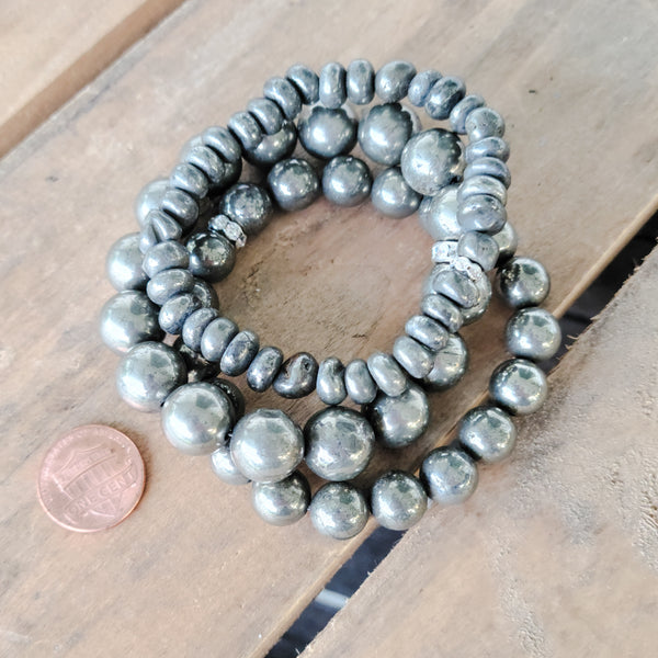 Pyrite gemstone pile of stretch bracelets