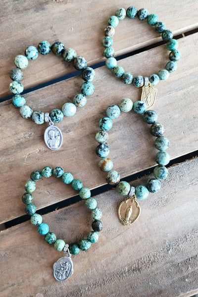 turquoise agate stretch bead bracelets with religious medals
