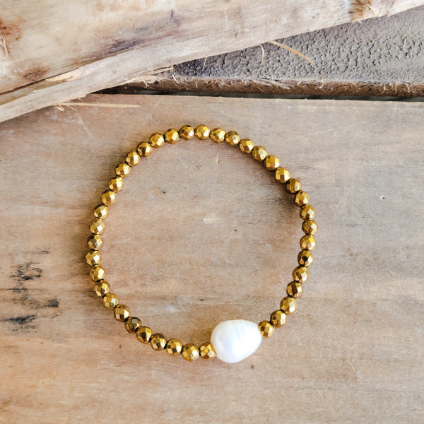 4mm gold hematite fw pearl stretch b