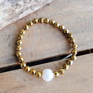 6mm gold hematite fw pearl stretch b