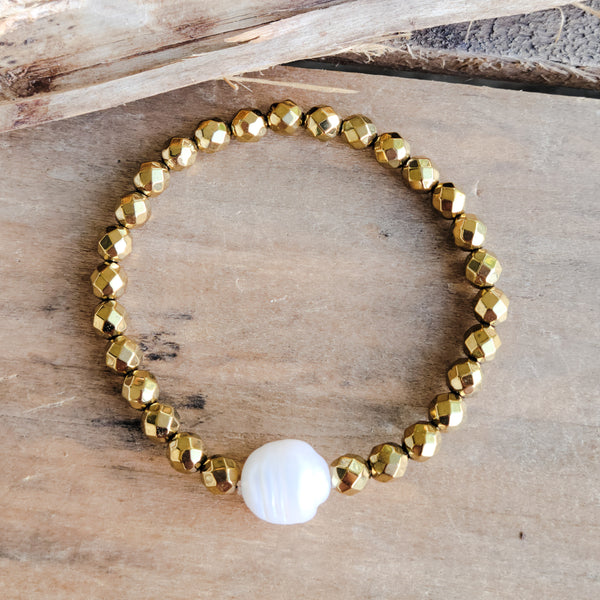 6mm gold hematite fw pearl stretch b