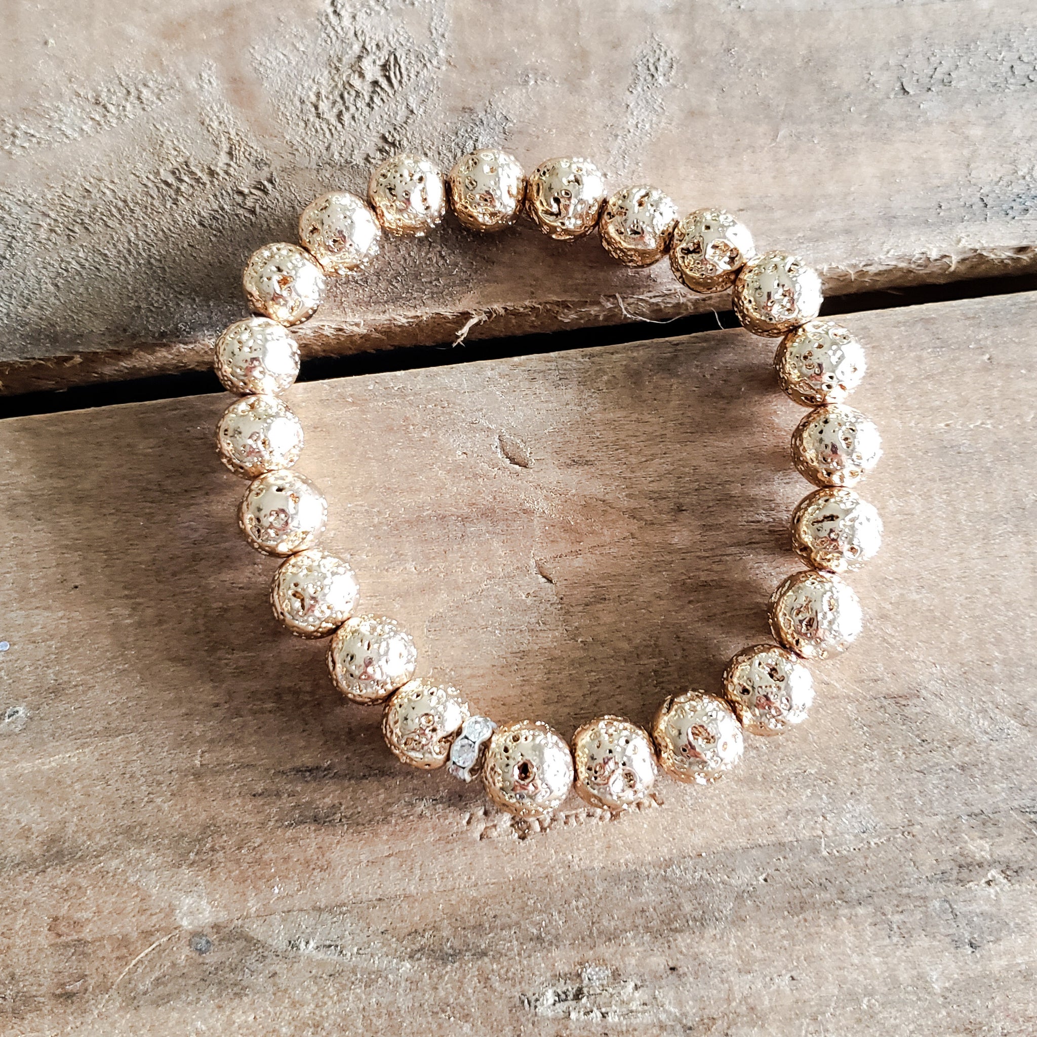 lt. gold metallic lava stone protection bracelets 8mm round